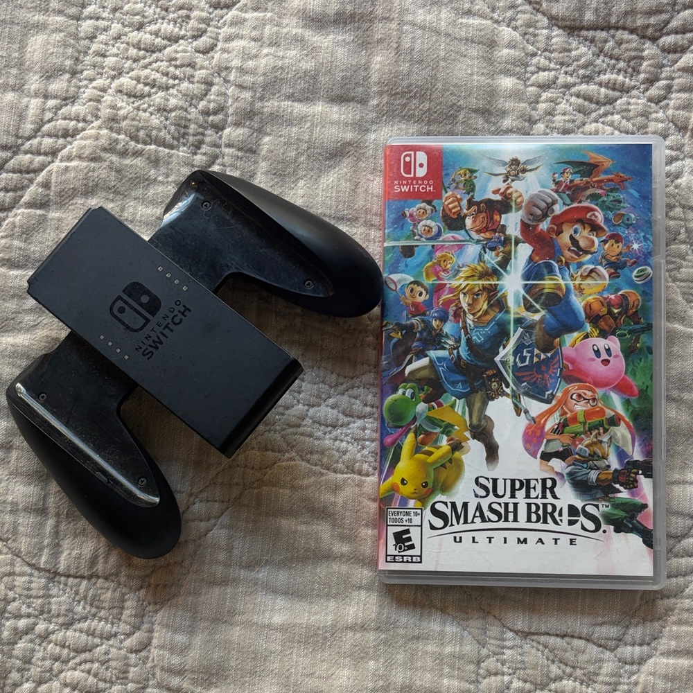Nintendo Switch Black Grip Accessory with Super Smash Bros. Ultimate Game